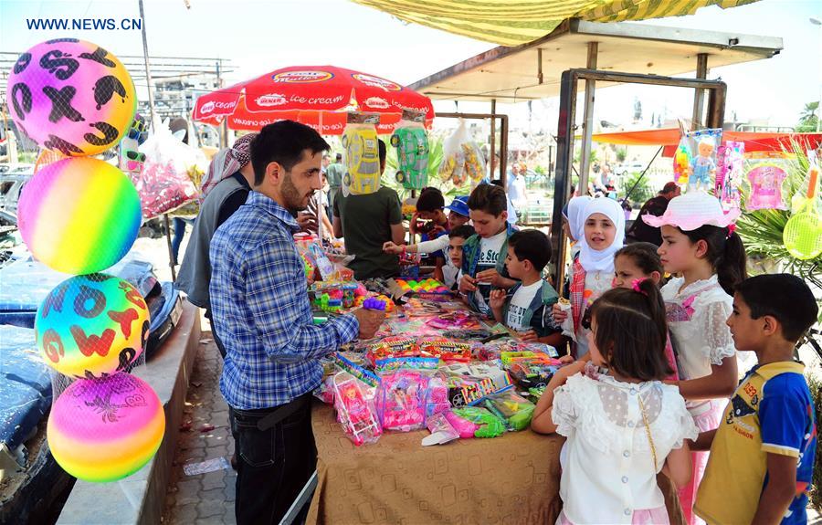 SYRIA-DAMASCUS-EID-AL-FITR-CELEBRATION
