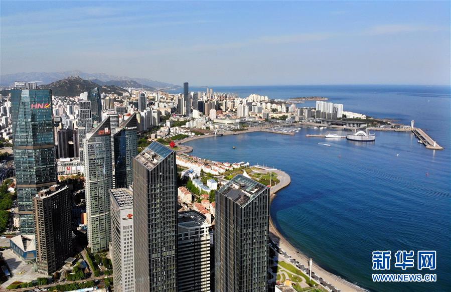 (圖文互動·百城百縣百企調研行)(5)開放之門越開越大 城市“本錢”越積越厚——青島對外開放發展紀實