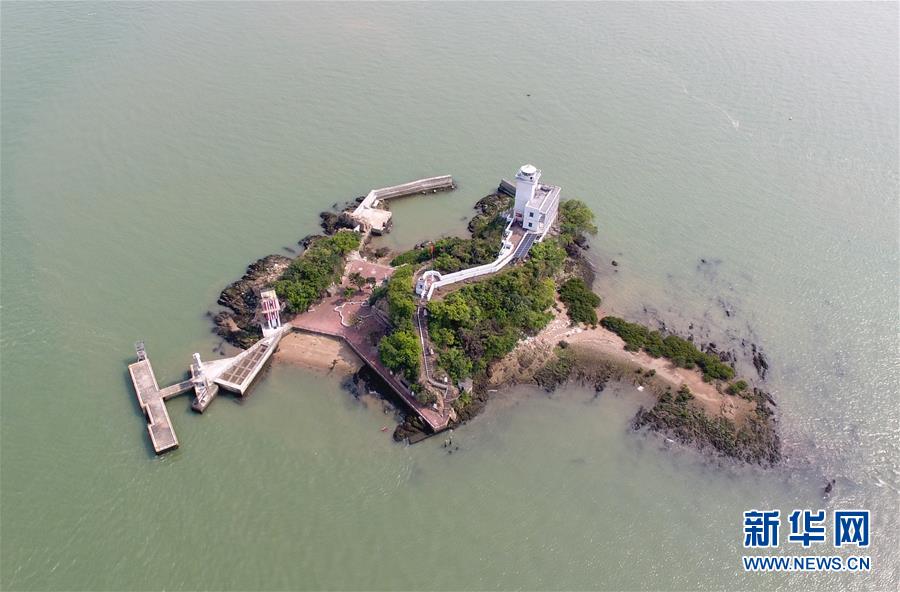 (新華全媒頭條·圖文互動)(2)守望——記舢舨洲“島主”黃燦明一門四代航標(biāo)工