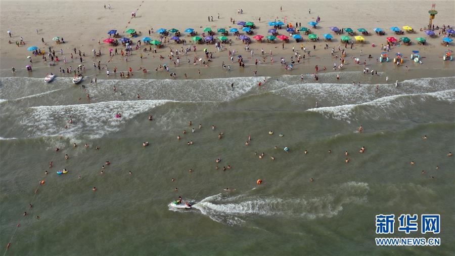 （壯麗70年 奮斗新時代——推動高質(zhì)量發(fā)展調(diào)研行·圖文互動）（3）近海能看鯨魚白海豚，廣西這片濱海旅游勝地啥來頭？