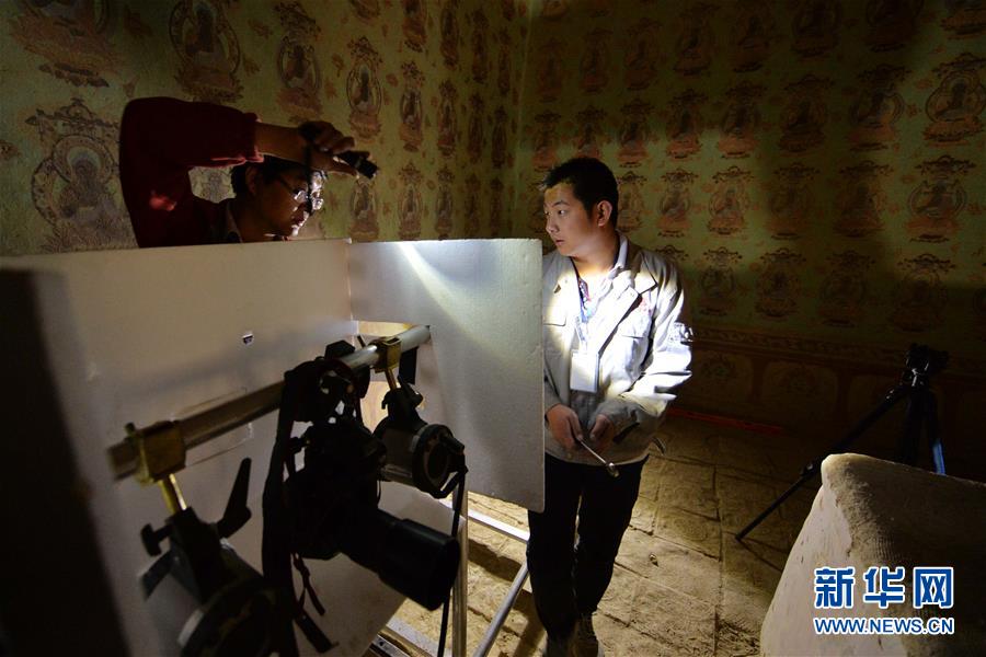 （時代先鋒·圖文互動）（16）此生不悔入沙海 勇擔重任始見金——敦煌研究院文物保護利用群體群像