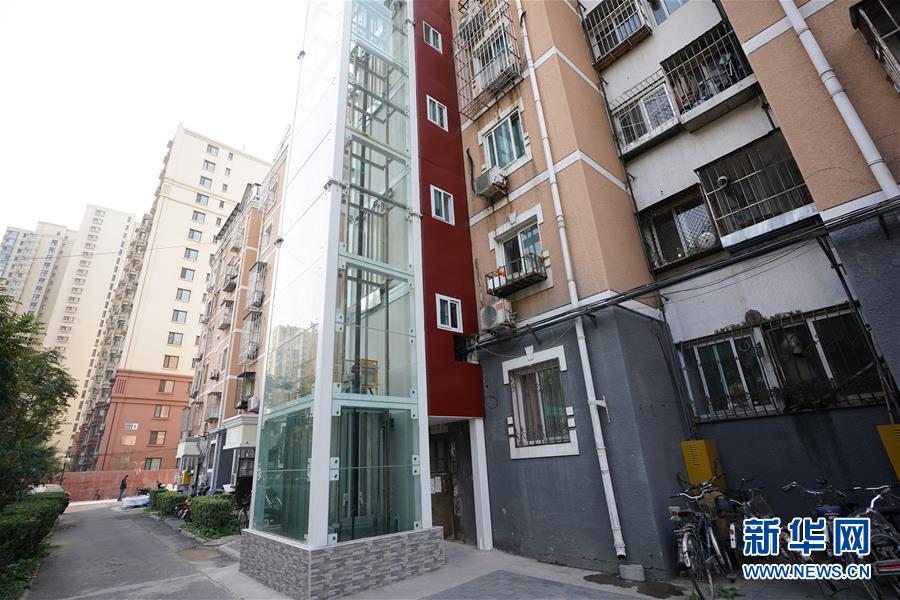 (新華全媒頭條·圖文互動)(3)88級臺階,終于不再是座“山”?——北京老舊小區(qū)加裝電梯現(xiàn)狀調(diào)查