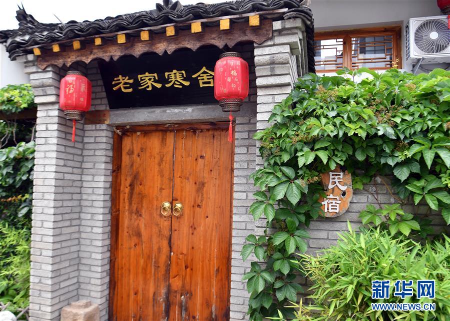 (新華全媒頭條·走向我們的小康生活·圖文互動)(6)大山深處有“新家”——大別山村繪出現代版“富春山居圖”