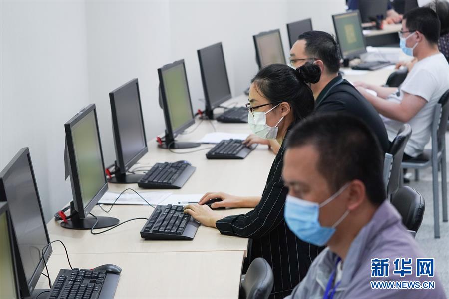 (教育)(1)北京:走進(jìn)高考評(píng)卷點(diǎn)