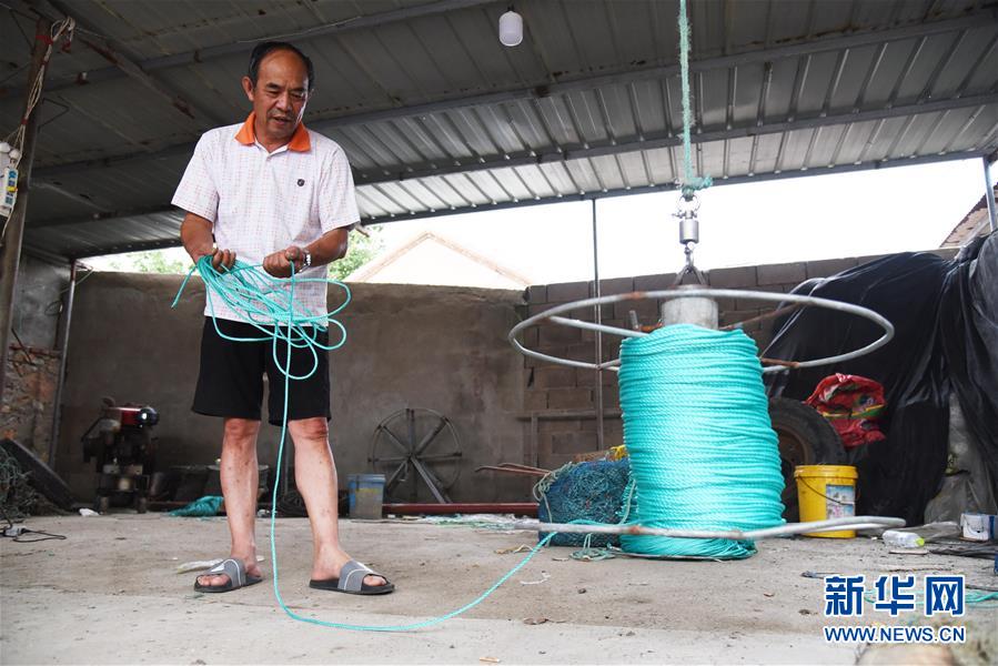 (走向我們的小康生活·圖文互動)(5)長島漁民的扇貝喜事:從請客求人買到供不應求