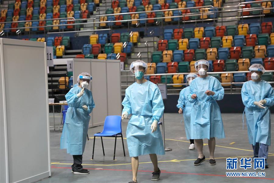 （圖文互動(dòng)）（2）“身為醫(yī)護(hù)人員一分子，應(yīng)該出來幫忙”——參與新冠病毒社區(qū)檢測的香港醫(yī)護(hù)人員速寫