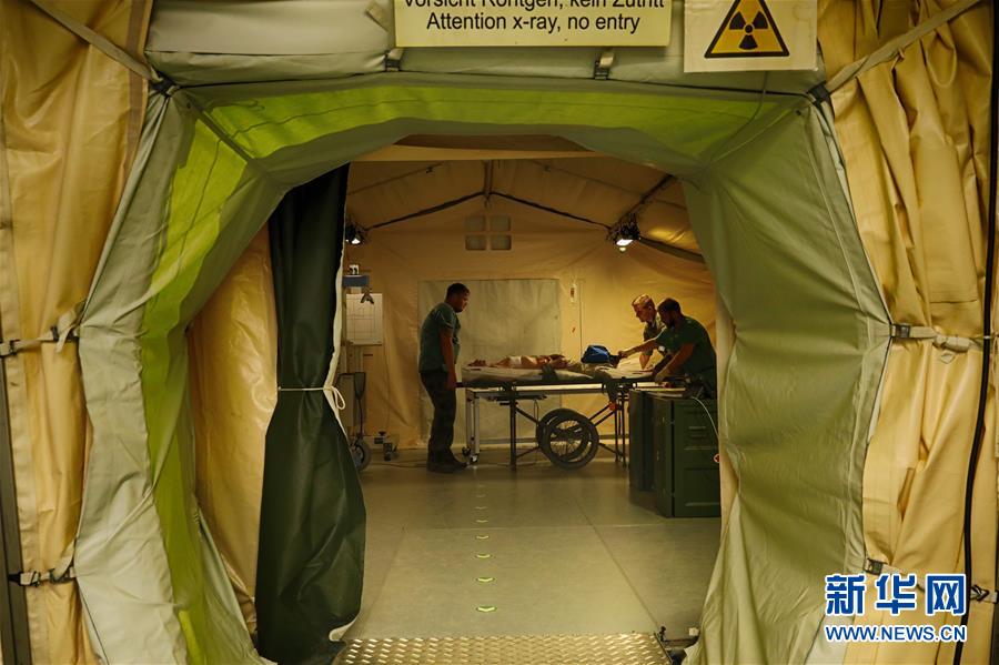 (國際·圖文互動)(1)“共同的理念,讓合作更深入更順暢”——走進中德“聯合救援-2019”衛勤實兵聯合演習德方野戰二級醫院
