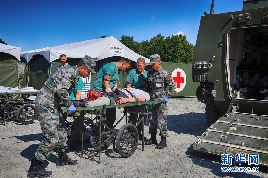(國際·圖文互動)(6)“共同的理念,讓合作更深入更順暢”——走進中德“聯合救援-2019”衛勤實兵聯合演習德方野戰二級醫院
