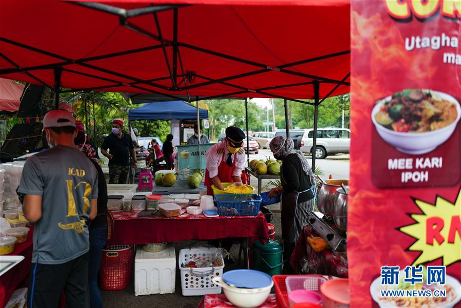 （國際·圖文互動）（5）通訊：前方總有機遇——記馬來西亞一位飛行員疫情下擺攤再就業